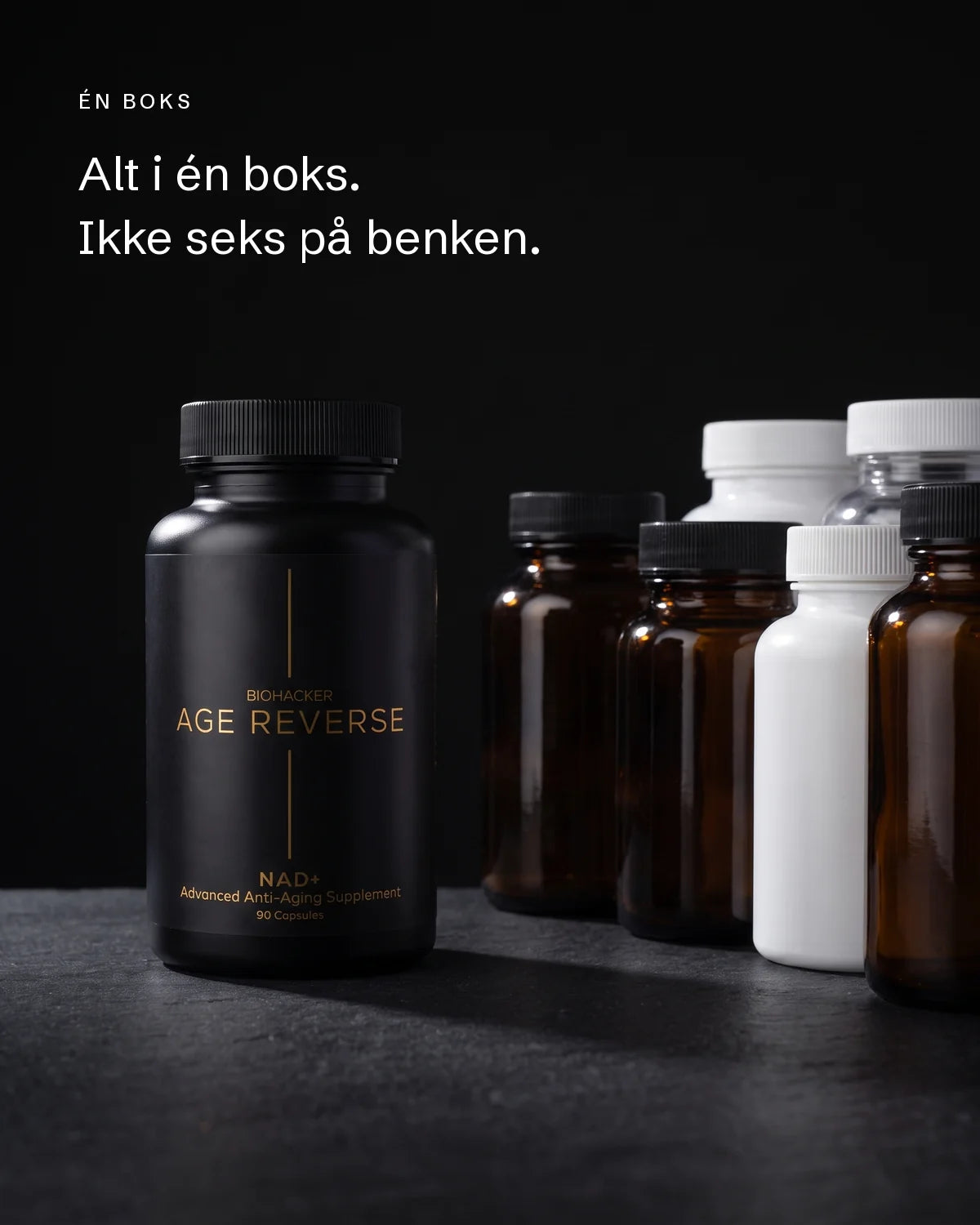 Biohacker Age Reverse ved siden av seks andre kosttilskuddbokser